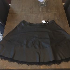 Black fo-leather skirt with lace detail (NWT)